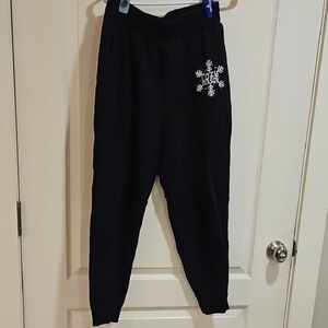 Black Joggers with White Snowflake Design